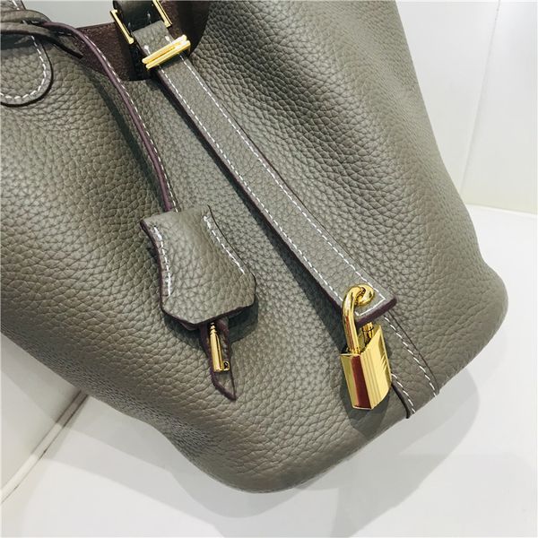 

new head leather litchi pattern women's bag gold button vegetable basket bucket fashion simple leisure hand purses clearance