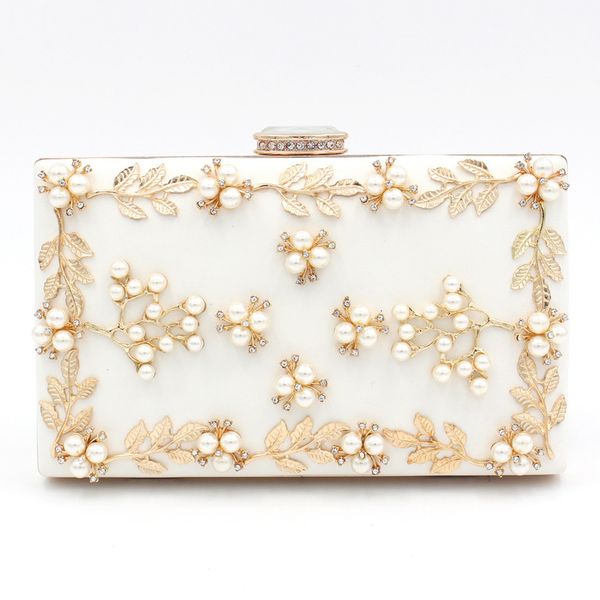 

flower dinner five gold flowers evening light luxury hand holding women's bag