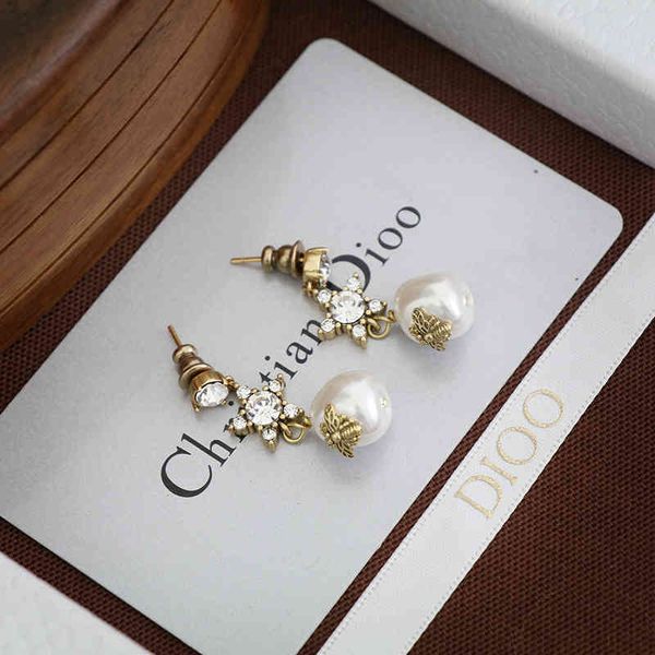 

2022 factory wholesale new pearl female new dijia net red diamond earrings, Golden