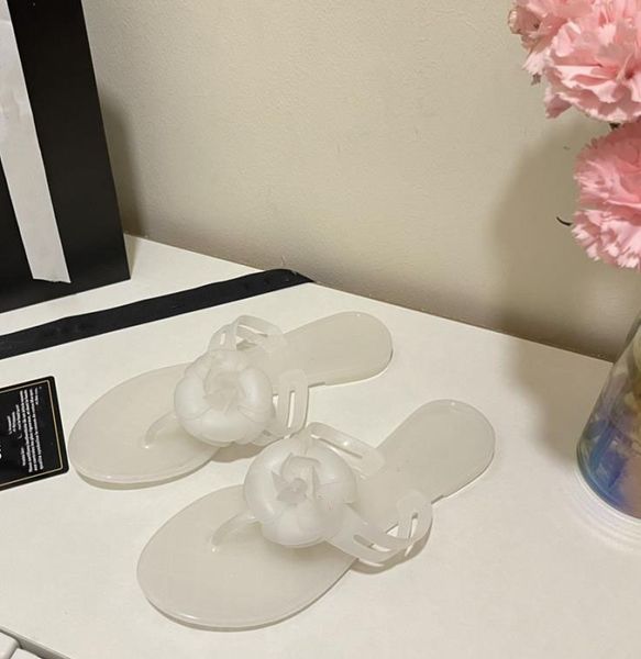 

2022 designer brand spring and summer flat bottom slippers women's flip flops transparent jelly pvc material 35-40 size, Black