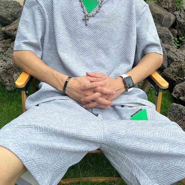 

22ss designer high woven sportswear summer casual suit men and women with the same wide chest front triangle bv t-shirt shorts suit, Gray