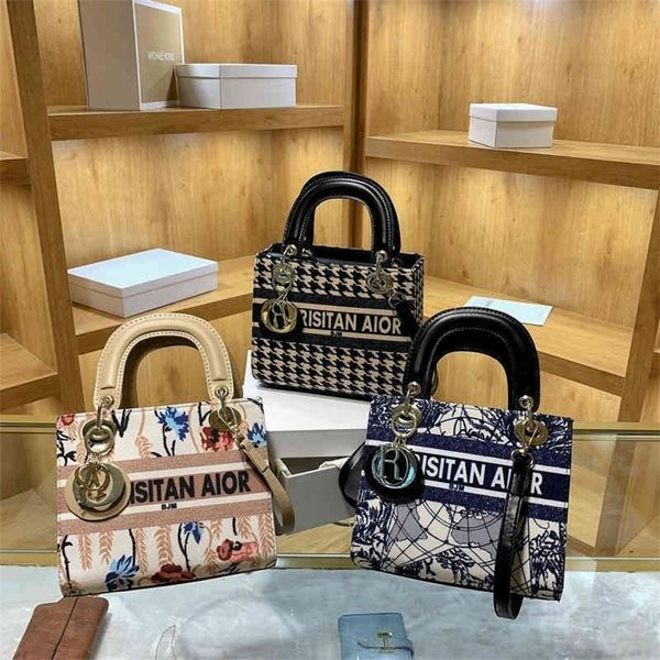 

56% off 2022 new trendy handbags explosive models spring love graffiti personalized hand female trendy