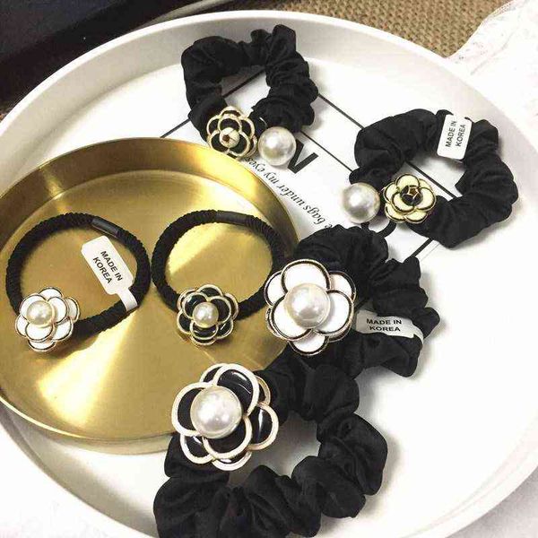 

france pearl flower camellia hair ties ropes headband luxury handmade rose elastic hair band pearl hair accessories wholesale aa220323, Pink