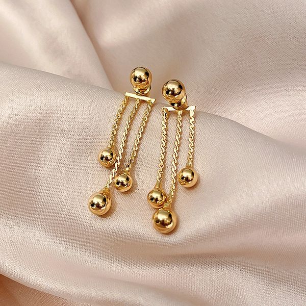 

japanese and korean style golden ball tassel earrings metal design simple fashion long earrings personalized minority graceful eardrop