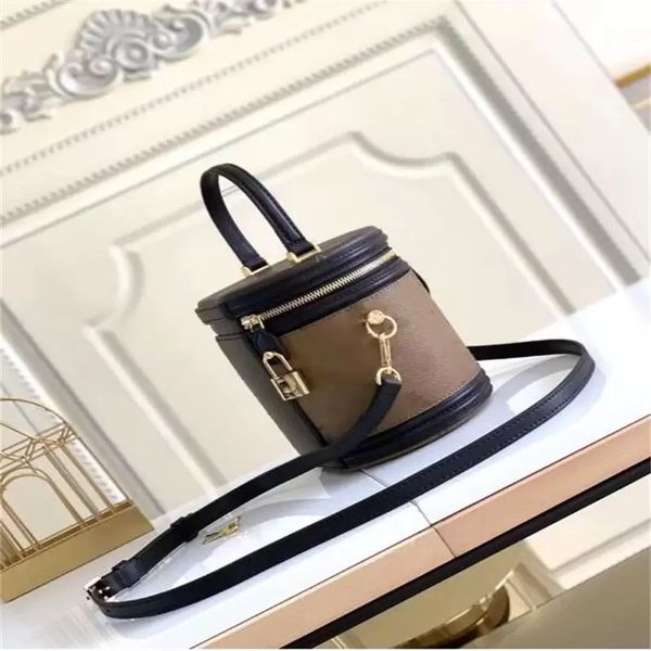 

classic round shape bag with shoulder strap hand bill of lading shoulder slung metal trim