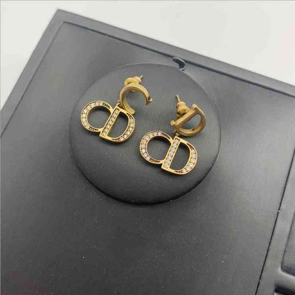 

2022 factory wholesale new dijia new inlaid diamond earrings net red high version anti allergy silver needle earrings female, Golden