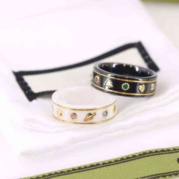 

2023 designer new jewelry double sterling silver bee black and white ceramic love star hand couple ring
