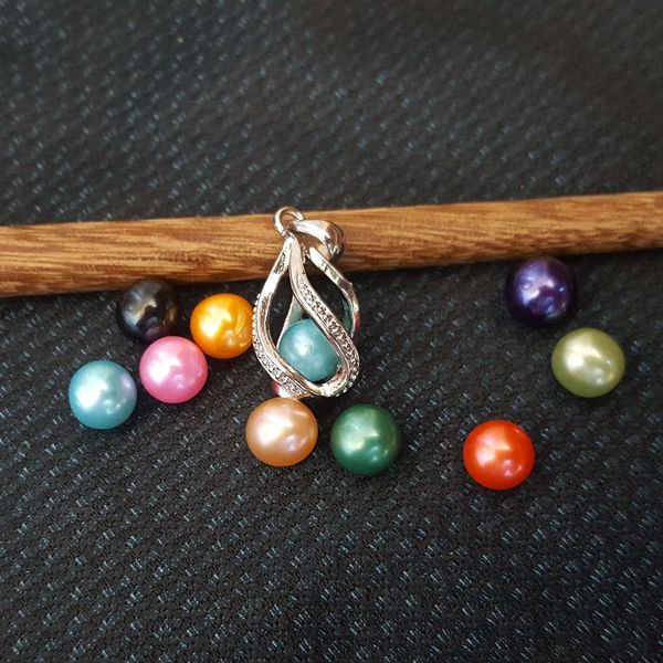 

wholesale fashion jewelry silver plated pearl cage lockets 300 diffrent designs locket pendant findings essential oil diffuser p39-p57