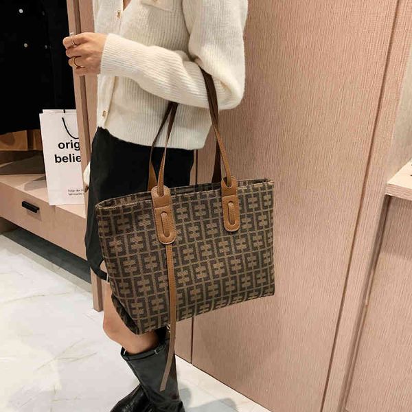 

fashion women's new high-quality versatile bag luxury designer flower weaving fashion bag canvas large capacity one shoulder tote