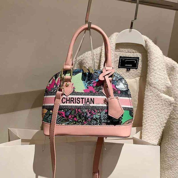 

fashion bag 70% off factory clearance 2022 new women's shell hand single shoulder messenger bag color painting graffiti printing foreig