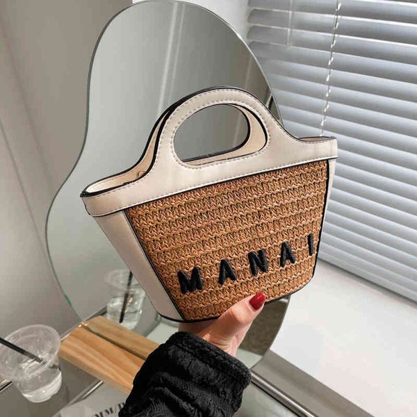 

2022 factory wholesale new portable women's summer fashion grass woven , small and versatile vegetable basket, messenger bag, beach bag