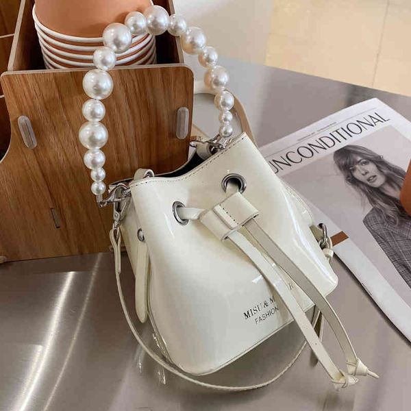 

spring net red small bag 2021 new fashion pearl messenger women's ins foreign style one shoulder bucket bag