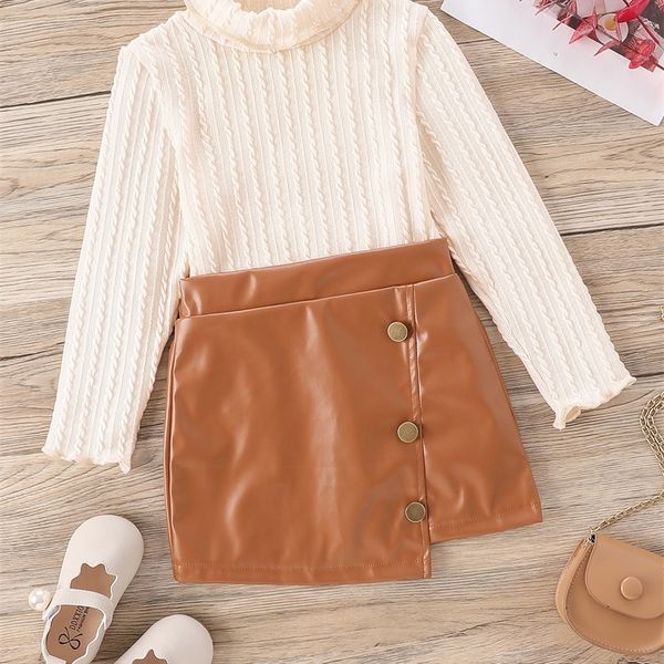 

little girl's high neck fungus edge t-shirt and pu leather skirt she, White