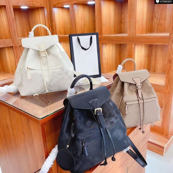 

designer backpack with old flower embossed pattern. bags.