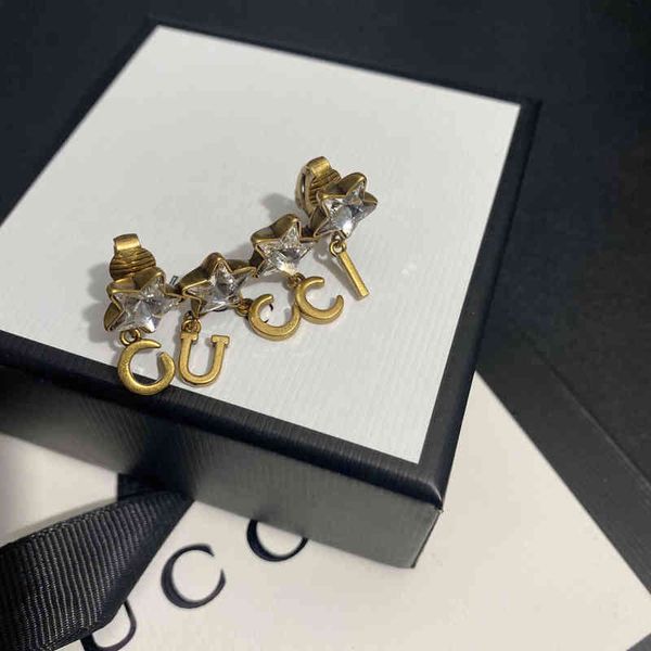 

2022 factory wholesale new personality tassel unilateral atmosphere clip versatile ear hole ancient home five pointed star earrings, Golden
