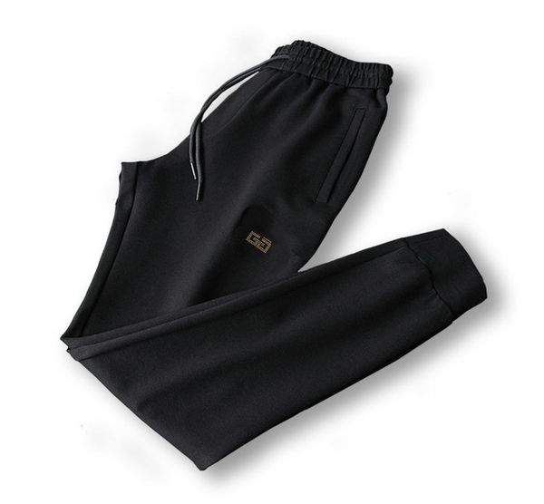 

22ss designer youth sports pants men's trend summer thin fast dry casual foot running trousers black fitness men spring and autumn