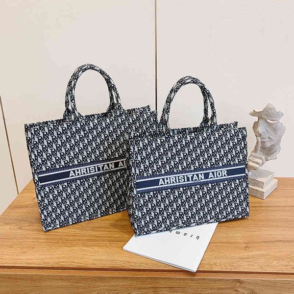 

2022 factory wholesale new canvas shopping large capacity women's net red star same mummy hand fashion shoulder bag