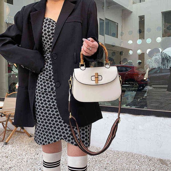 

30% off 2022 new designer bags spring fashion high sense messenger bamboo knot portable saddle tide one shoulder net red women's