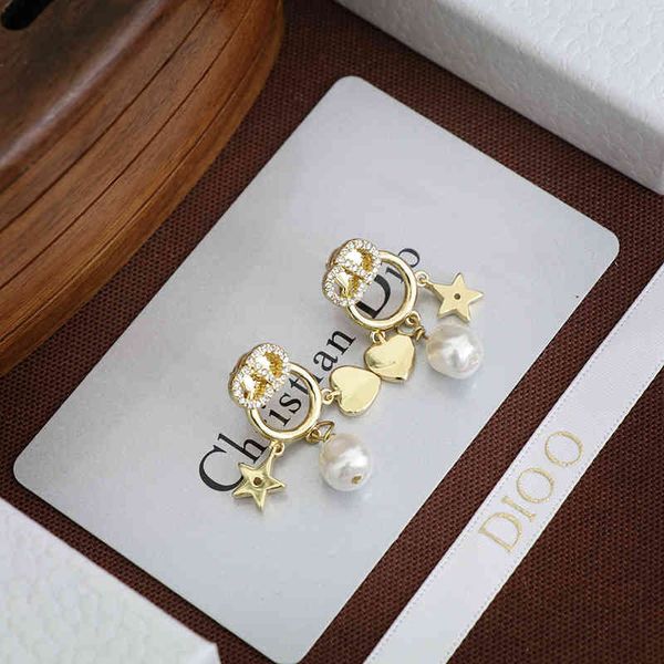 

2022 factory wholesale new pearl female new dijia peach heart love star front and back earrings, Golden