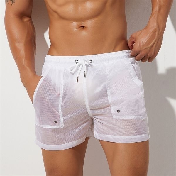 Verão Mens Shorts Sexy Semi-transparente Nylon Quick Seco Academias Casuais Casas Desgaste Homens Bottoms 220318