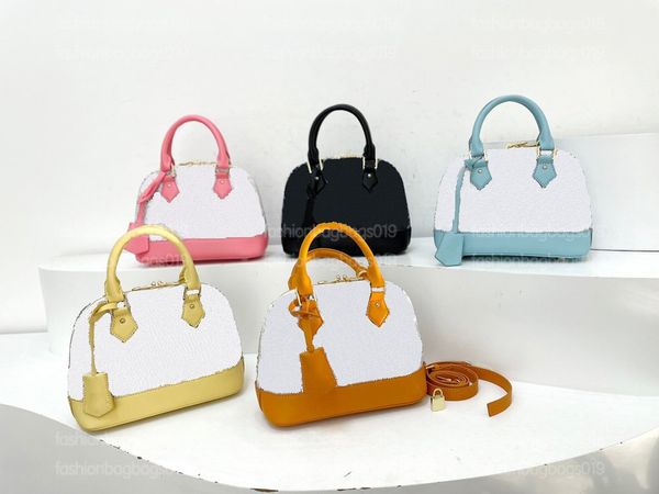 

alma 1854 jacquard textile small shell bag yellow pink blue monograms flowers crossbody vintage stylishly compact key bell bb designer bags