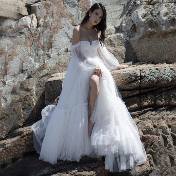 

fabulous bohemian wedding dresses off the shoulder bridal gowns long sleeves a line sweep train tulle beach robe de mariee, White