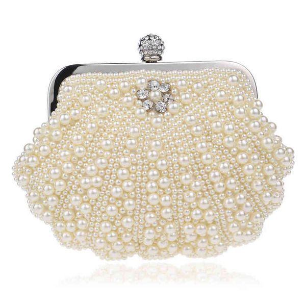 

nxy evening bags new fashion shell design women beaded handmade diamonds chan shoulder messenger crystal wedding 220506