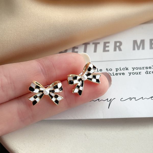 

bow earrings women's black and white checkerboard temperament high sense of minority new personalized, Golden;silver