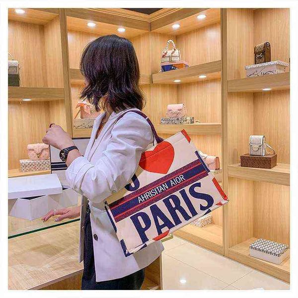 

factory sale 45% off 2022 new graffiti portable canvas large capacity fashion printed tote bag foreign temperament single shoulder bag