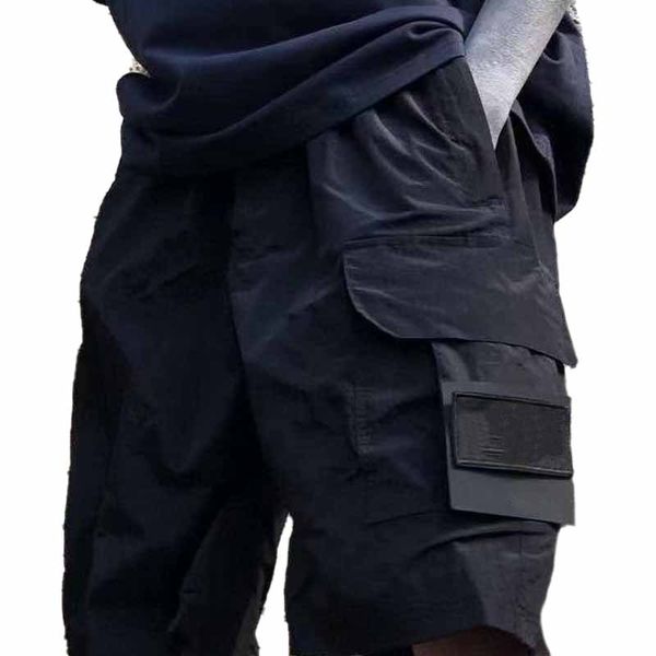 2810 # shorts masculinos novos plissados tecido de náilon verão solto moda marca bolso ferramentas shorts calças japonesas.