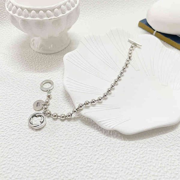 

2023 designer new jewelry silver buddha bead buckle bracelet double pendant hand decoration hip hop gift version, Black