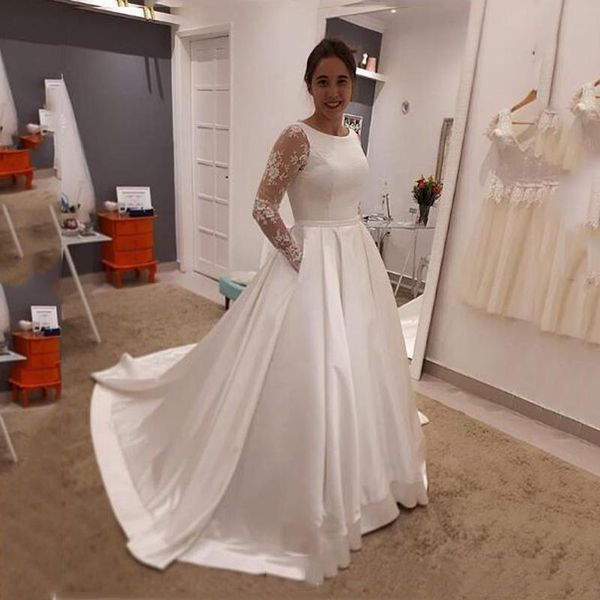 Altri abiti da sposa eleganti maniche lunghe con applicazioni in pizzo 2022 con tasche scollo tondo strascico di corte abiti da sposa in raso altro