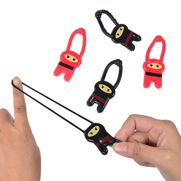 Ninja Launcher TPR Auswurf Dekompression Spielzeug Vent Elastic Little Man Finger Dart Kinder Geschenke für Kinder