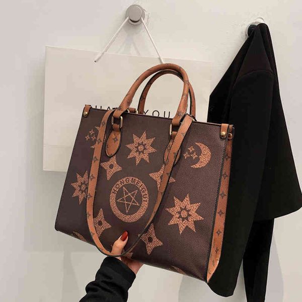 

factory outlet fan yangqi one shoulder high-capacity tote women's 2022 autumn new leisure fashion messenger bag