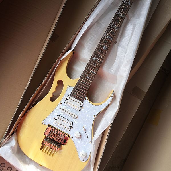 

6 strings yellow electric guitar with tremolo bar rosewood fretboard