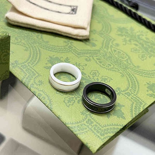 

2023 designer new fashion jewelry gujia edition double black white ceramic men's and women's bee planet phnom couple pair ring, Silver