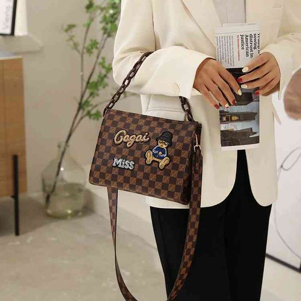 

2022 factory wholesale new winter new fashion thousand bird embroidered cartoon bear one shoulder messenger bag letter printed lattice bag x