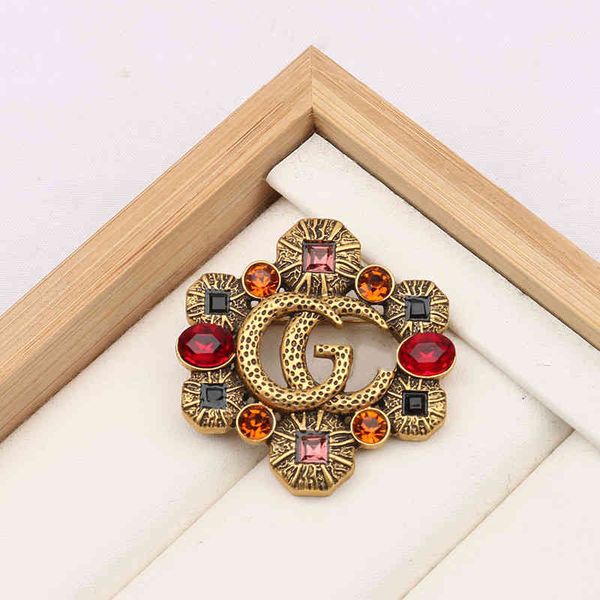

factory wholesale new fashion hollowed out color diamond zircon inlaid brooch anti light coat pin female, Gray