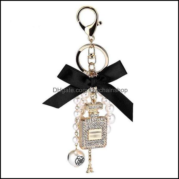 Schlüsselanhänger Modeaccessoires Kreative handgemachte DIY Diamant pro Flasche Legierung Bogen Perle Luxus Schlüsselbund Geldbörsen Charm Anhänger Ys068 Drop Deliv