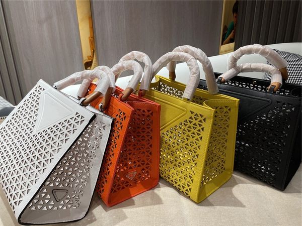 

classic triangular hollow design hand bag womens designer square basket totes small leather wooden handle shoulder bags with em