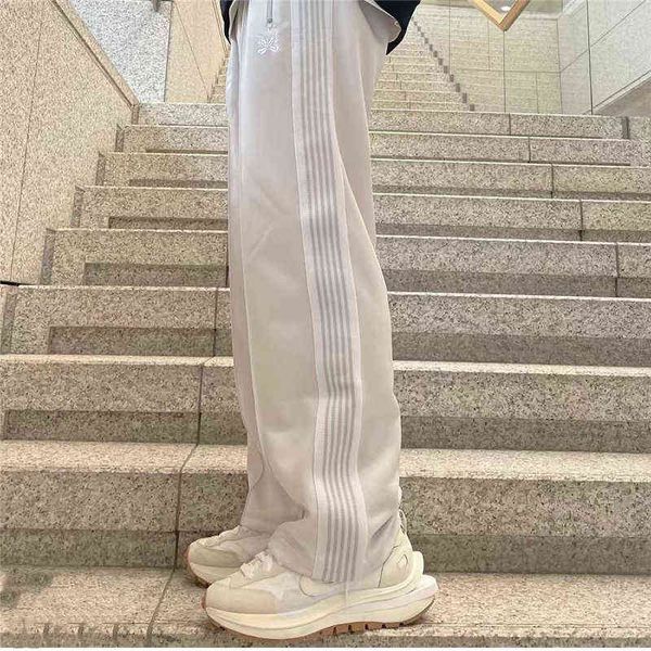 Calça de moletom com listras brancas agulhas masculinas e femininas de alta qualidade bordada borboleta AWGE calças de corrida