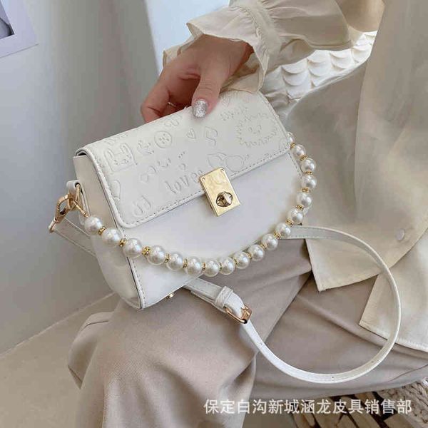

ladies fashion luxury brand tide bag wholesale women versatile new women's embossed single shoulder messenger portable small