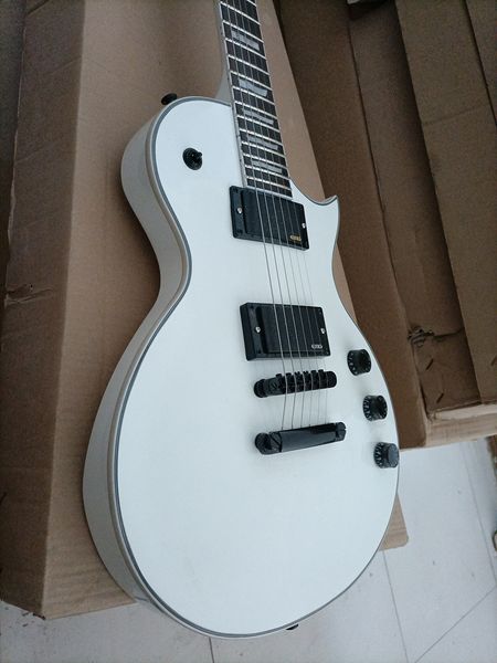 

6 string white electric guitar with active pickups rosewood fretboard