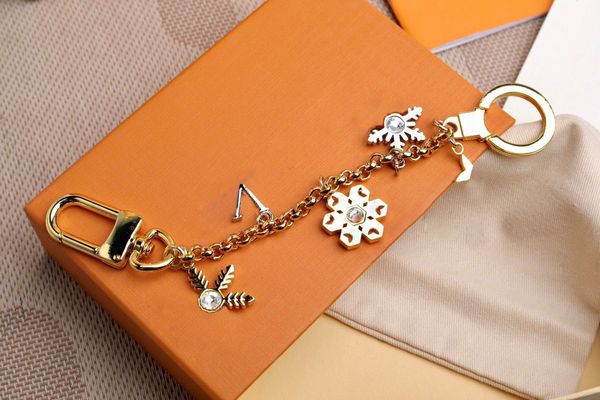 

luxurys designers keychain classic brand key buckle flower letter key chain bag ring handmade keychains men women bags pendant multiple colo, Silver