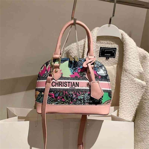

women's shell hand single messenger color painting graffiti printing foreign trade cross-border bags design purses online