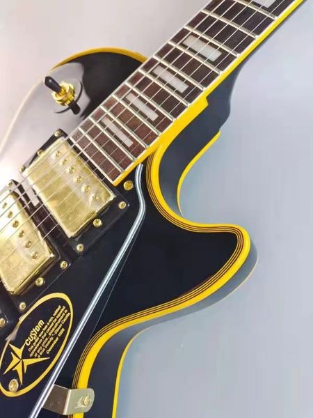 

electric guitar, black guitar, golden accessories, mahogany body, rosewood fingerboard, guitar on sale