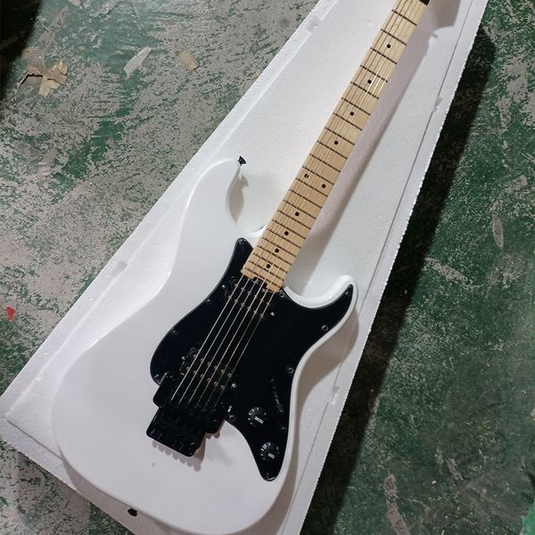 

white chav electric guitar with treomo bar maple fretboard