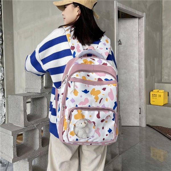 Zaini da scuola Distintivo carino Zaino da donna con motivo a latte Borsa da donna alla moda di Harajuku Zaino da viaggio leggero di grande capacità 2022