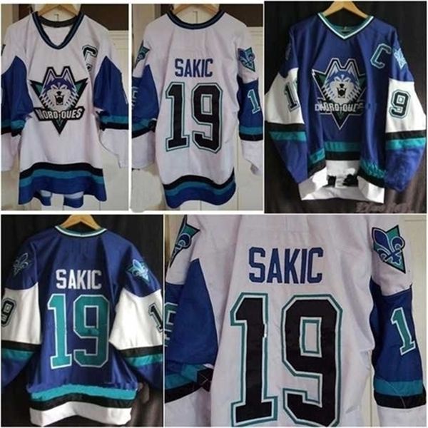 C26 NIK1 40QUEBEC NORDIQUES # 19 Joe Sakic Beyaz Mavi Nik1 Tage Erkek Buz Hokeyi Jersey Özel Kod Boyutu S-4XL