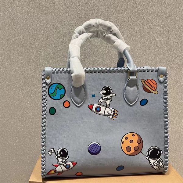 Jiang 2022sss novo designer de sacola astronautas bolsas de desenho animado Bolsas Bolsas Bolsa Moda grande impressão duplex Diferentes bolsas de estilo